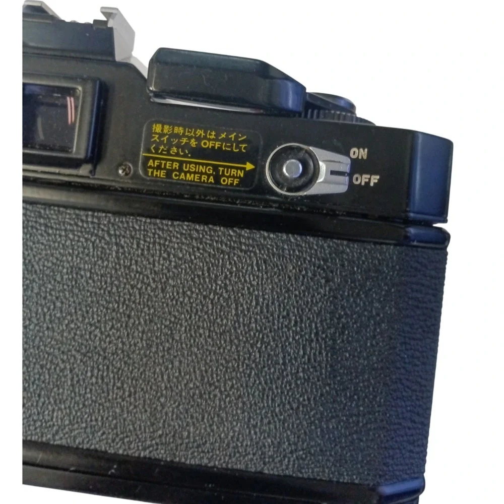 Vintage Canon EF SLR 35mm Film Camera with 135‎ mm Zoom Lens, Made in Japan